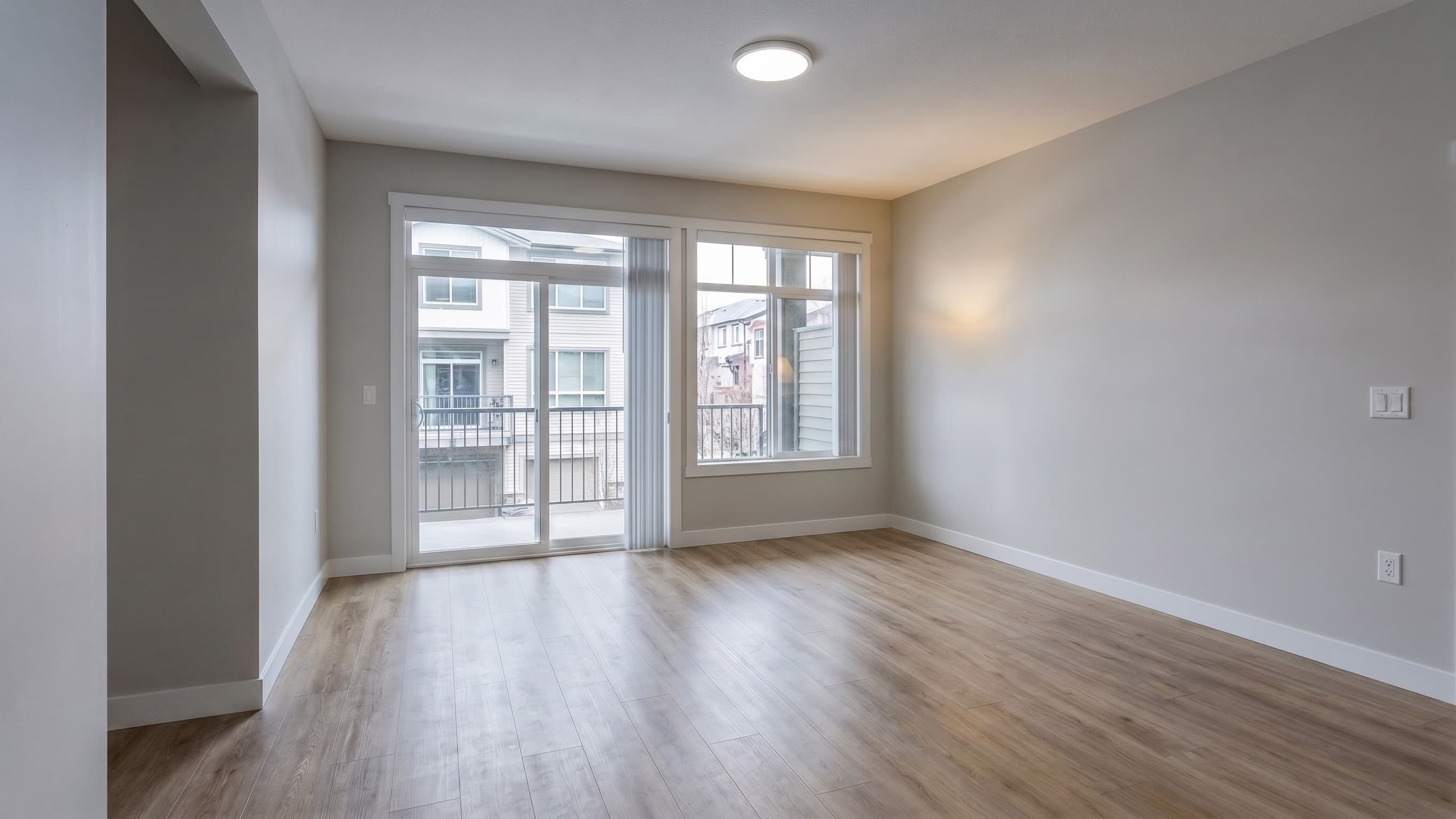 Clean empty living room after AI furniture removal, belongings cleanup, and listing photo enhancement