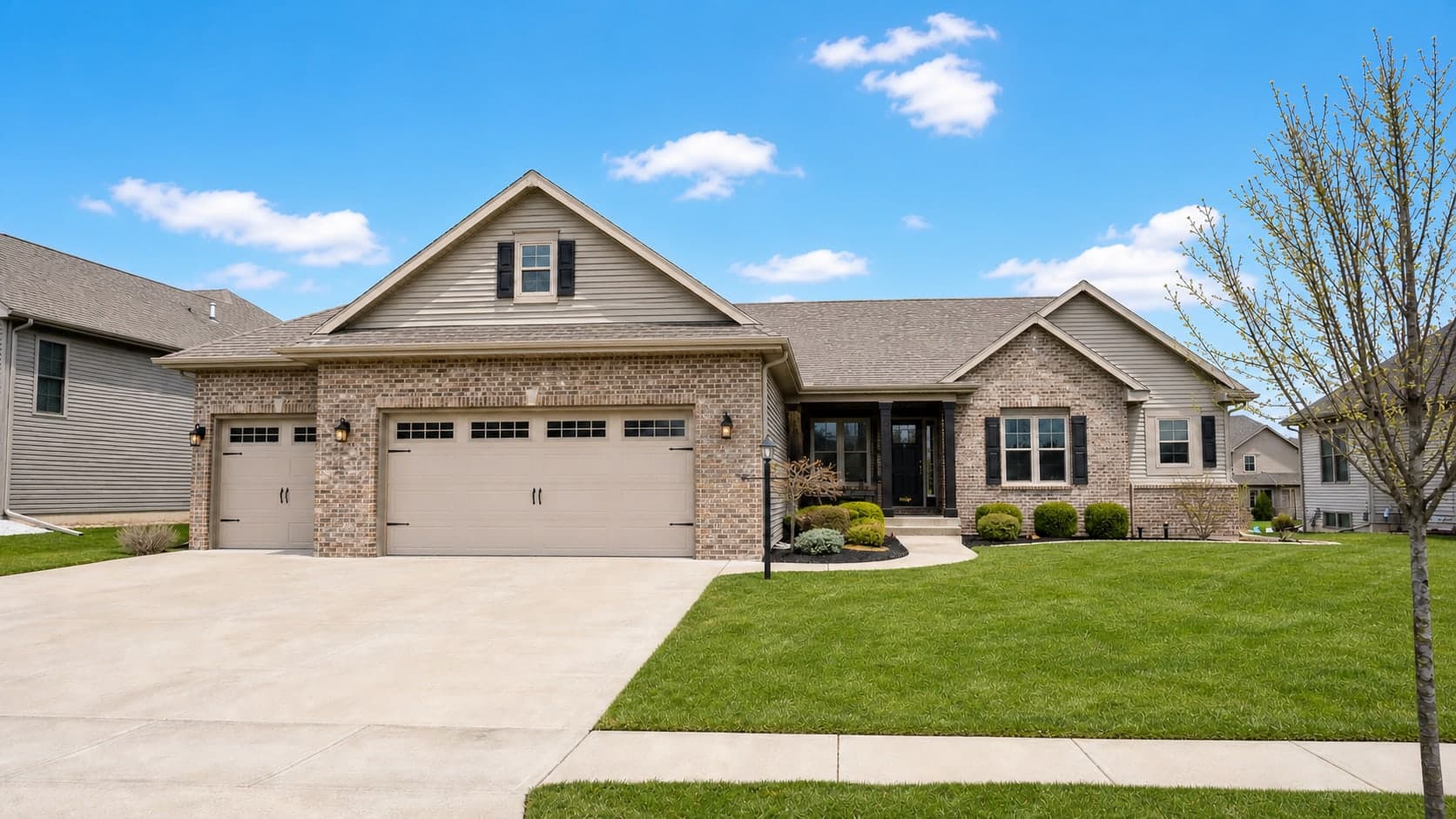 Suburban listing exterior with blue sky replacement and brighter natural real estate photo lighting