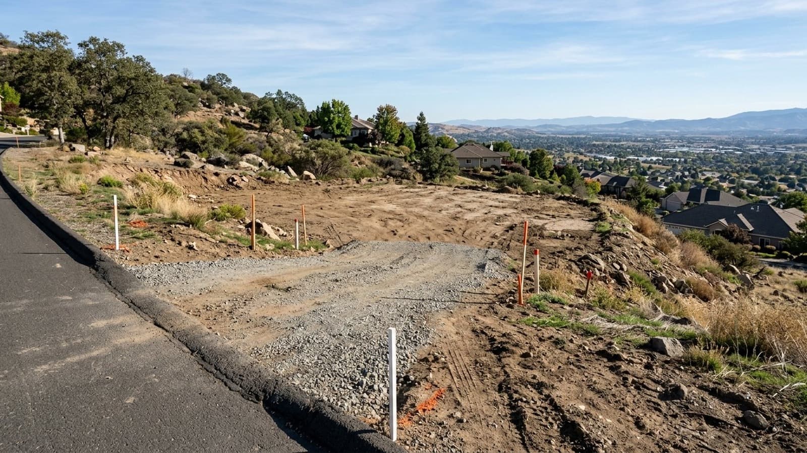 Vacant sloped view lot before AI house rendering